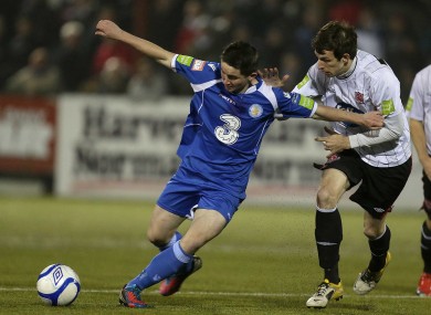 Dundalk's Paul Whelan (right) with Sean Maguire of Waterford United.