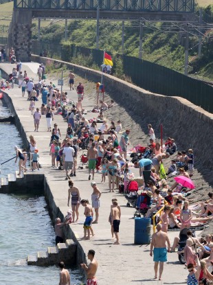 The packed bathing area at Seapoint in Co Dublin this afternoon