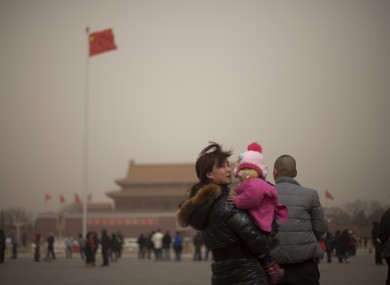 A family visits Tiananmen Square in China (File photo)