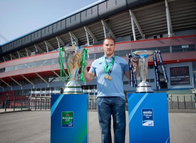 Pictured with the Heineken Cup and the Amlin Challenge Cup at the Millennium Stadium is Gethin Jenkins of the Cardiff Blues, a previous winner of both trophies.