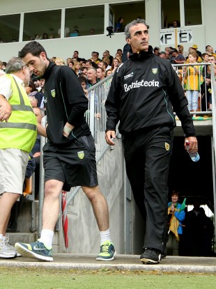 McGuinness leaves the tunnel in Carrick on Shannon alongside Mark McHugh.