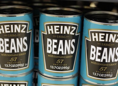 Heinz Beans on the supermarket shelf.
