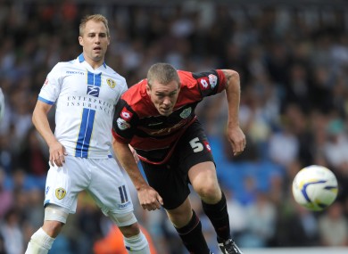 Leeds United's Luke Varney and Queens Park Rangers' Richard Dunne during today's game.