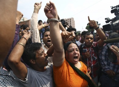 Protesters shout slogans demanding the death penalty for the four men earlier this week