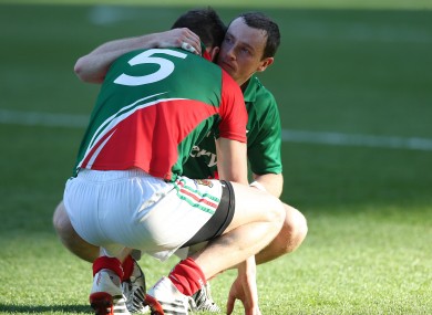 Mayo's Lee Keegan is consoled by Keith Higgins after the game.