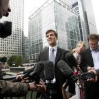 Edourd D'Archimbaud, 24, from Paris, who started his first day's work at Lehman Brothers, speaks to the press after learning that he no longer has a job there<span class=