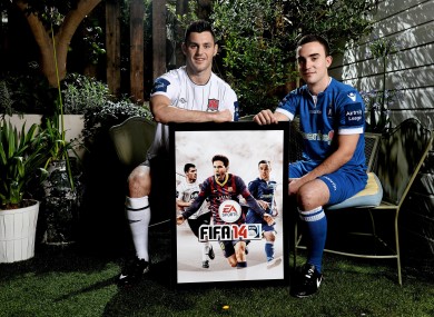 Dundalk's Patrick Hoban and Shane Tracy from Limerick FC pose on the cover of FIFA 14.