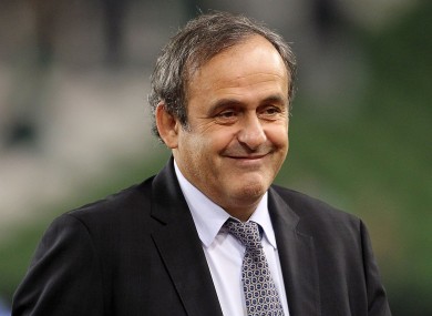 Michel Platini has admitted politics played a role in Qatar being given the World Cup.