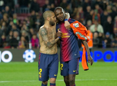 Alves, left, with Abidal before the Frenchman left Barcelona.