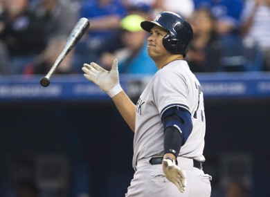 Alex Rodriguez reacts to striking out against the Toronto Blue Jays.
