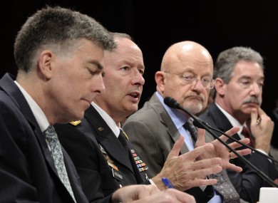 National Security Agency director Gen. Keith Alexander, second from left, testifies before the House Permanent Select Committee on Intelligence about potential changes to the Foreign Intelligence Surveillance Act (FISA)