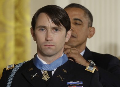 President Barack Obama awards the Medal of Honor to retired Army Captain William D. Swenson of Seattle, Washington yesterday.