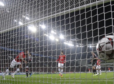 Gimme five: Antonio Valencia celebrates United's opening goal against Leverkusen.
