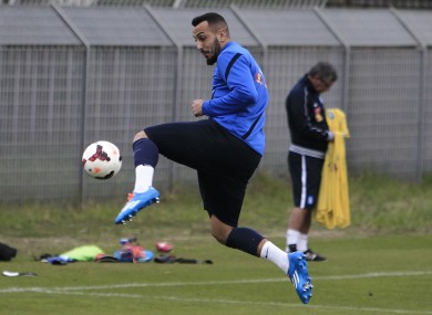Greece's Kostas Mitroglou controls the ball during a training session in Athens yesterday.