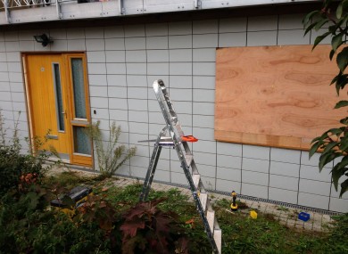 Boarded up windows in Peckford Place, Brixton, south London