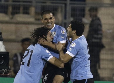 Uruguay trio Maxi Pereira, Edison Cavani and Luis Suarez celebrate one of the five goals.