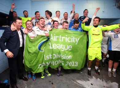 Collins and the Athlone players celebrating their First Division win in September.