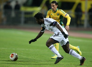 Swansea City's Wilfried Bony controls the ball as Kuban Krasnodar's Ivelin Popov closes him down.