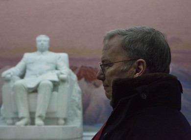 Google Executive Chairman Eric Schmidt stands near a statue of the late North Korean leader Kim Il Sung during his time in North Korea.