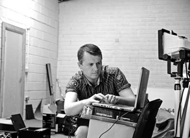 Colm at work on one of the Waterford Whispers video news updates.