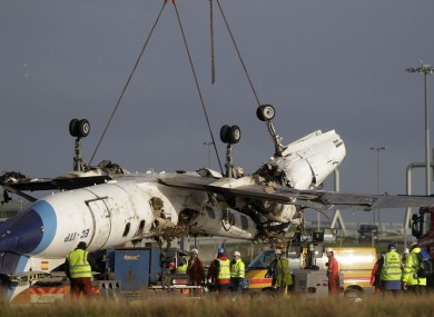 File photo from 2011 of the plane being removed from the crash site.