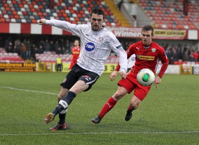 Bradley, left, in action against Cliftonville last week.