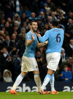 Alvaro Negredo (left) celebrates scoring his side's first goal.