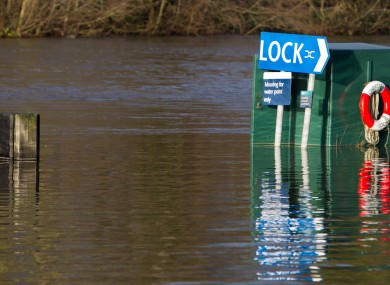 Areas next to the River Thames in Chertsey, Surrey, are flooded after the river burst its banks yesterday.