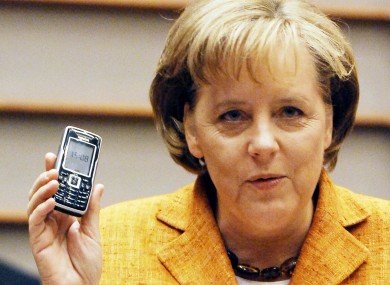 German Chancellor Angela Merkel and her mobile phone.