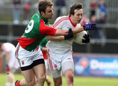 Colm Cavanagh of Tyrone and Jason Gibbons of Mayo