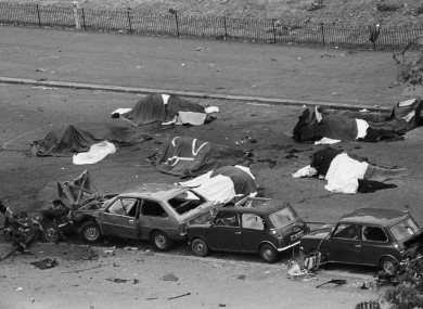 File photo dated 20/07/82 of dead horses covered up and wrecked cars at the scene after an IRA bomb exploded as the Household Cavalry was passing, in Hyde Park, London.