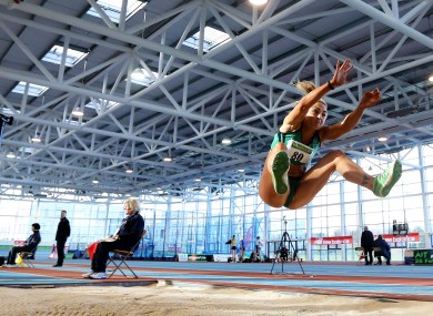 Kelly Proper in action in the long jump.