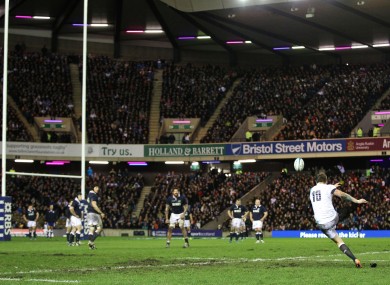 Owen Farrell of England kicks a penalty at Murrayfield.