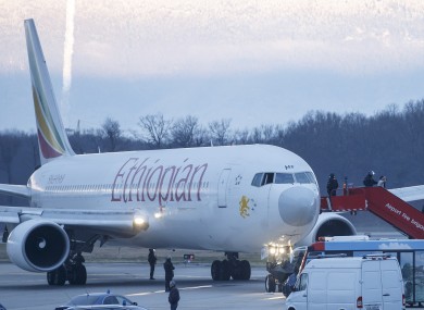 Passengers being evacuated from the hijacked Ethiopian Airlines plane.