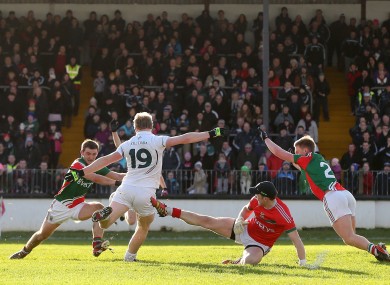 Tomas O'Connor fires the game's opening goal past Rob Hennelly.