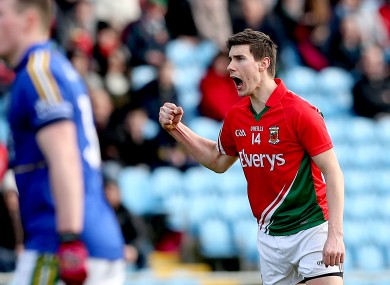 Alan Freeman celebrates scoring a free.
