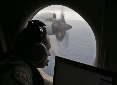 Flight officer Rayan Gharazeddine on board a Royal Australian Air Force AP-3C Orion, searches for the missing Malaysia Airlines Flight MH370 in southern Indian Ocean