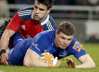 Brian O'Driscoll dives over to score.
