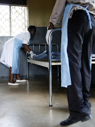 Medical personal prepare an isolation unit to care for Ebola victims