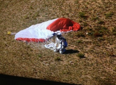 This iconic picture of Baumgartner landing was taken on an iPhone and is a picture of a television screen.