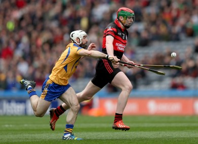 Portumna's Leo Smith with Edward Byrne of Mount Leinster.