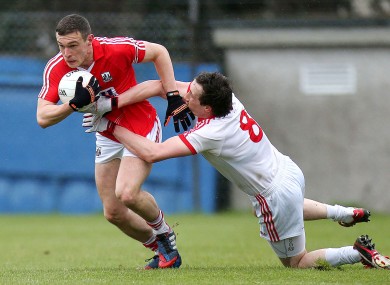 Cork's John O'Rourke and Tyrone's Colm Cavanagh.