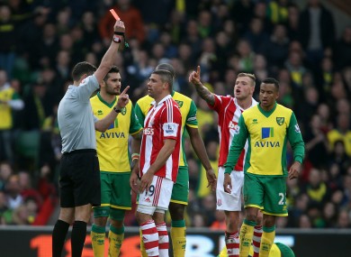 Walters is shown a red card on Saturday.