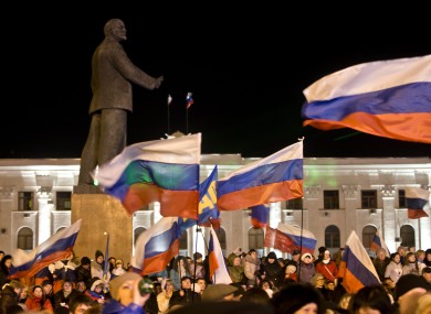 Pro-Russian people celebrate referendum vote in Lenin Square in Simferopol, Ukraine.