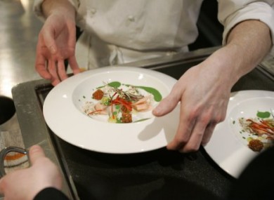 Chef Grant Achatz works in the Alinea restaurant kitchen in Chicago, named the best restaurant in the world.