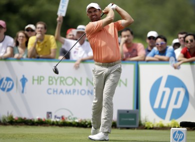 Padraig Harrington hits off the 16th tee during the third round of the Byron Nelson Championship golf tournament.