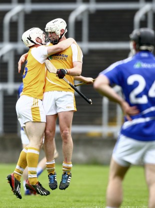 Antrim's Neal McAuley and Aaron Graffin celebrate at the final whistle.