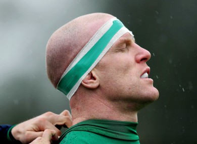 Ireland captain Paul O'Connell is fitted with his GPS and accelerometer device before training.