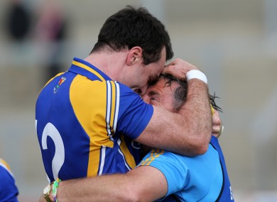 Longford's Paul Barden celebrates with manager Jack Sheedy.