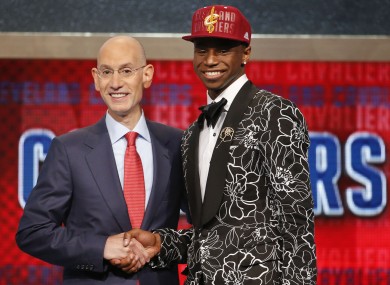 NBA Commissioner Adam Silver, left, congratulates Andrew Wiggins of Kansas.